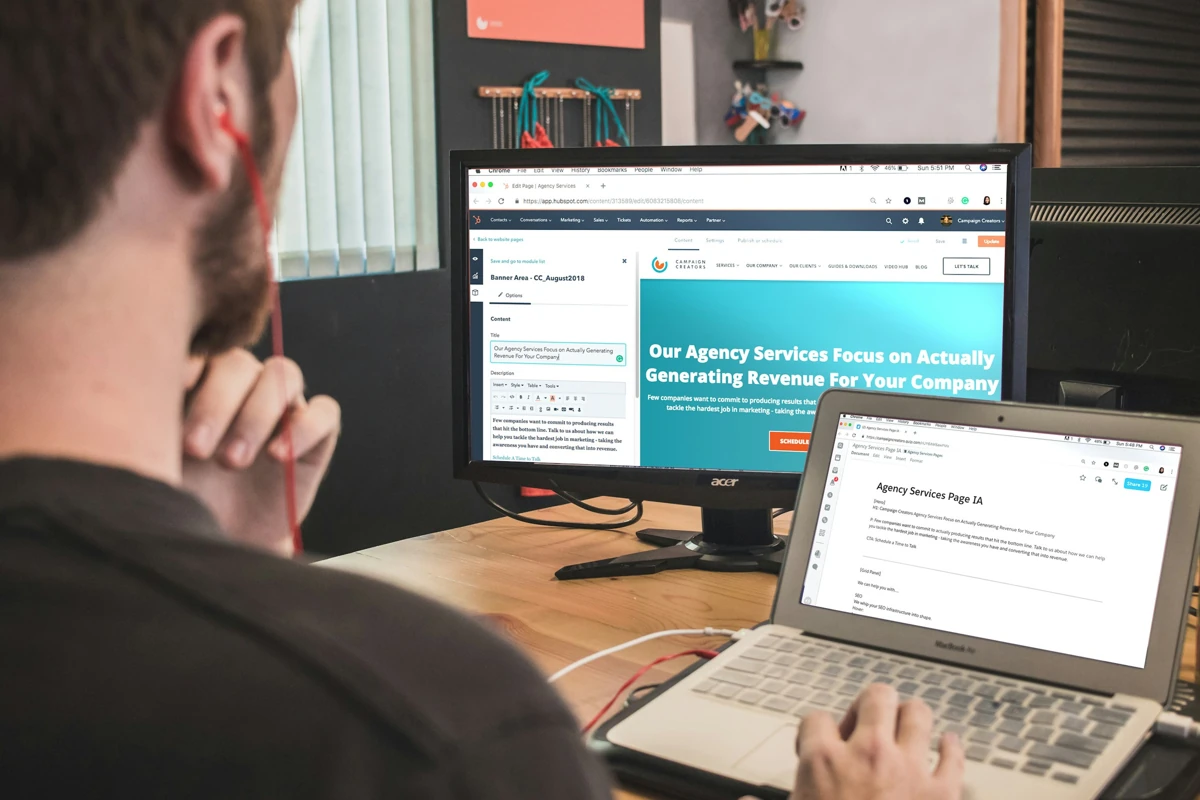 Person using a laptop while seated in an office
