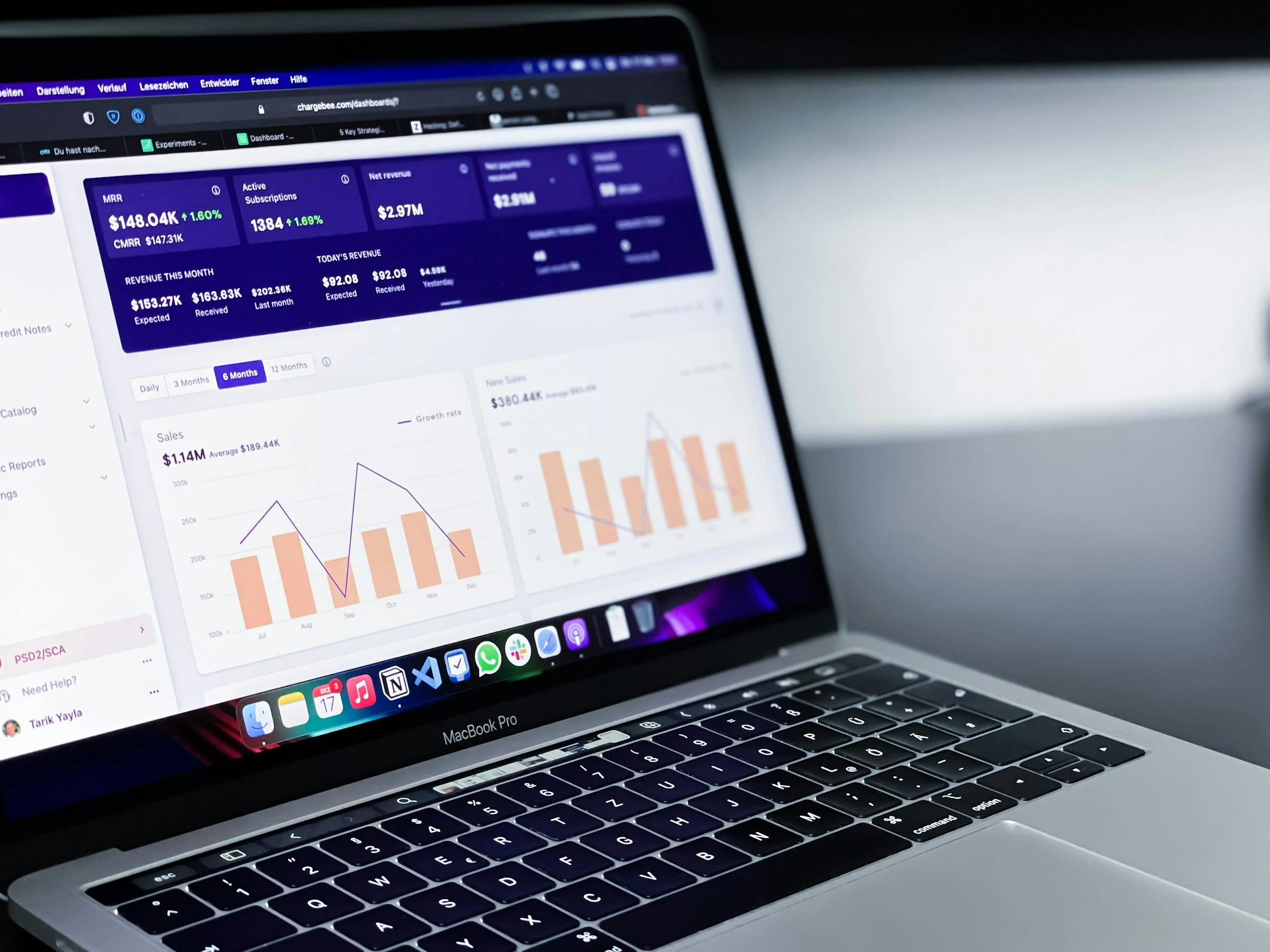 Analytics charts displayed on a laptop