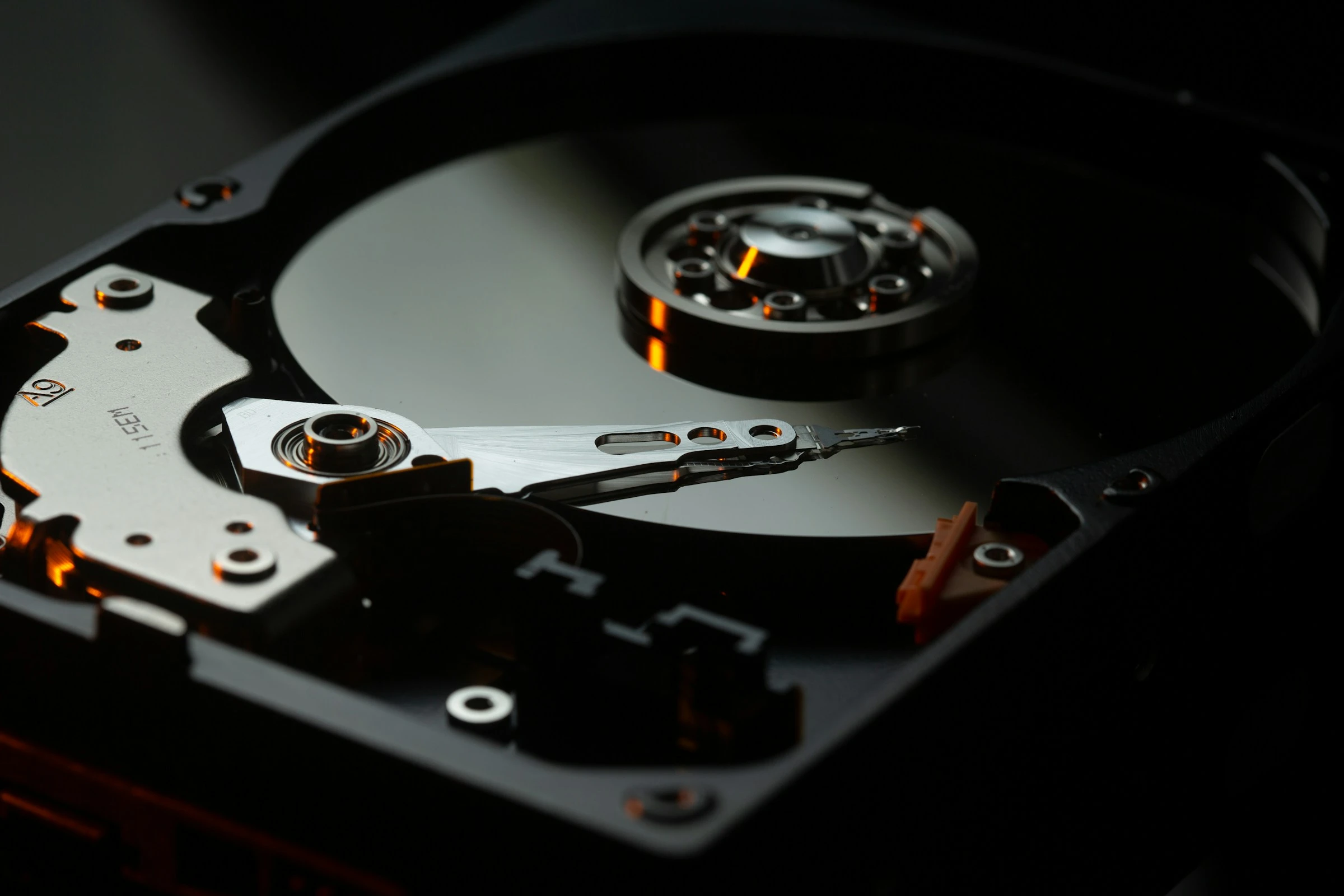 Close-up of the platter and actuator of a hard drive