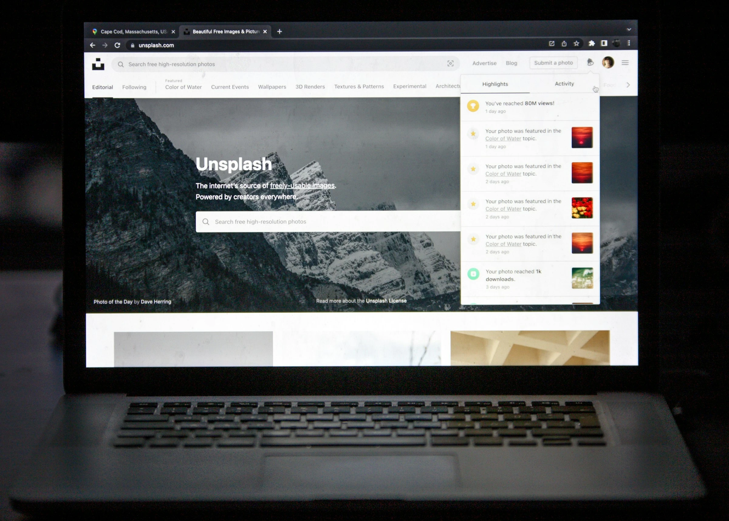 Photography website displayed on a laptop